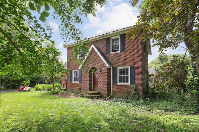 5 Baltimore Somerset Rd NE, Baltimore, OH 43105 - tudor house featuring brick siding and a front yard