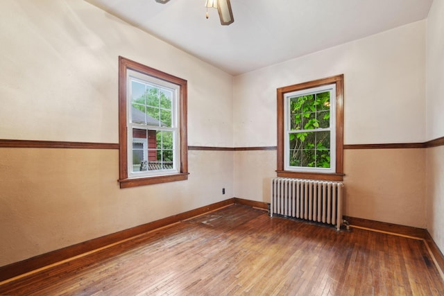5 Baltimore Somerset Rd NE, Baltimore, OH 43105 - unfurnished room with radiator, hardwood / wood-style floors, ceiling fan, and baseboards