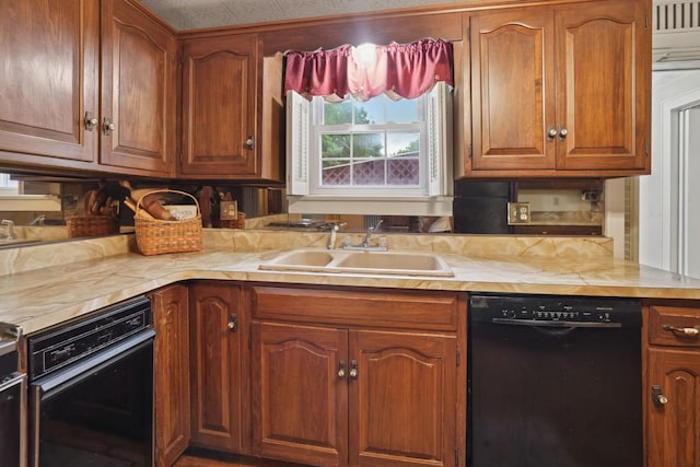 5 Baltimore Somerset Rd NE, Baltimore, OH 43105 - kitchen with black dishwasher, a sink, light countertops, and brown cabinets