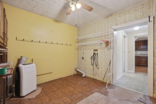 5 Baltimore Somerset Rd NE, Baltimore, OH 43105 - washroom with hookup for a washing machine, wallpapered walls, ceiling fan, baseboards, and brick patterned flooring