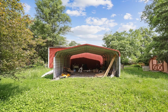 5 Baltimore Somerset Rd NE, Baltimore, OH 43105 - view of parking / parking lot featuring a carport and a storage unit