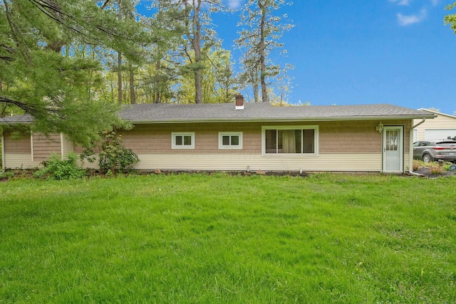 6810 Barrett Rd, Geneva, OH 44041 - back of property with a chimney and a yard
