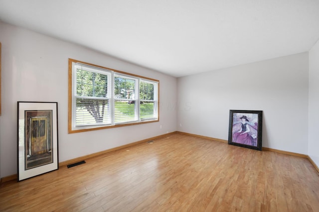134 Hasbrouck Cir, Howard, OH 43028 - unfurnished living room featuring light wood finished floors and baseboards