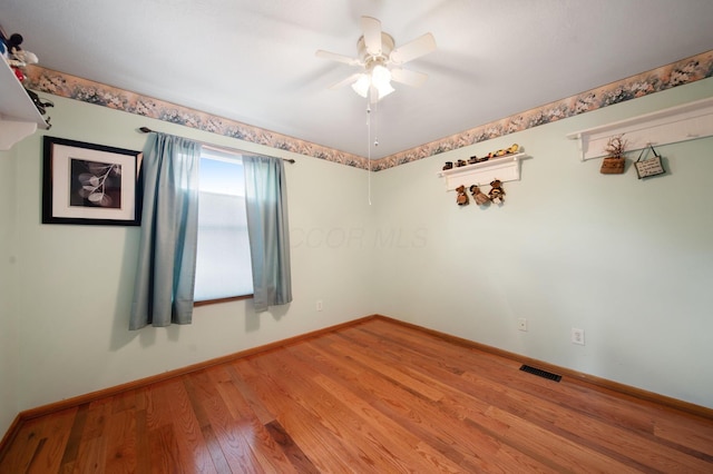 134 Hasbrouck Cir, Howard, OH 43028 - empty room featuring light wood-style floors, baseboards, and a ceiling fan