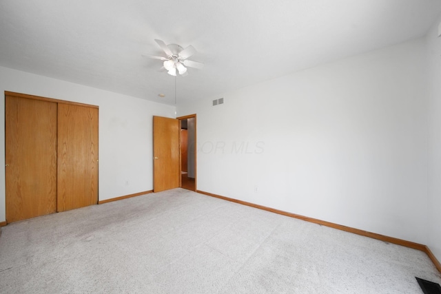 134 Hasbrouck Cir, Howard, OH 43028 - unfurnished bedroom featuring a closet, carpet, and baseboards