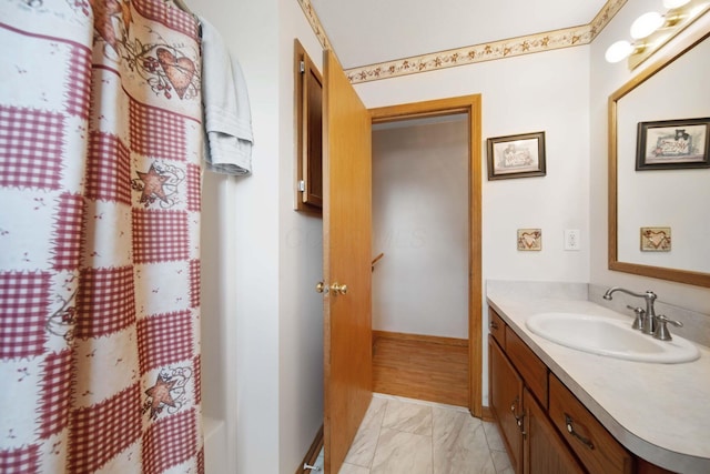 134 Hasbrouck Cir, Howard, OH 43028 - full bathroom featuring marble look tiles, vanity, a shower with shower curtain, and a tub