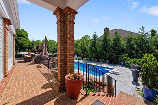7347 Lambton Park Rd, New Albany, OH 43054 - view of swimming pool featuring a patio area and a diving board