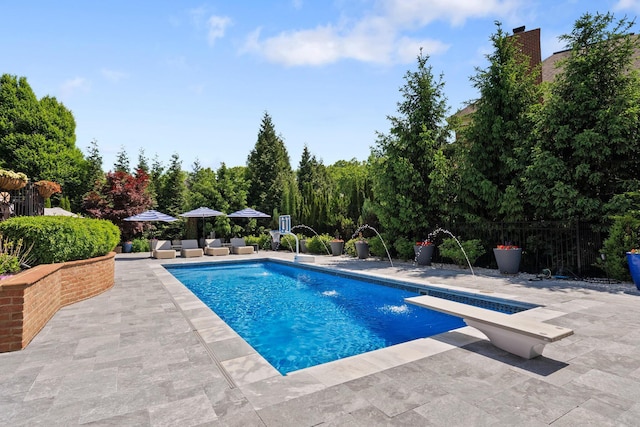 7347 Lambton Park Rd, New Albany, OH 43054 - outdoor pool featuring a patio and a diving board