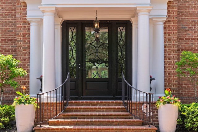 7347 Lambton Park Rd, New Albany, OH 43054 - doorway to property with brick siding