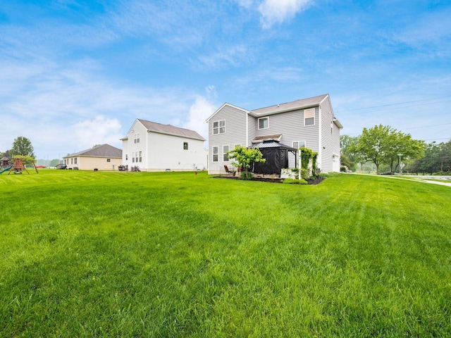 9035 Strawser St, Orient, OH 43146 - rear view of property with a gazebo and a lawn