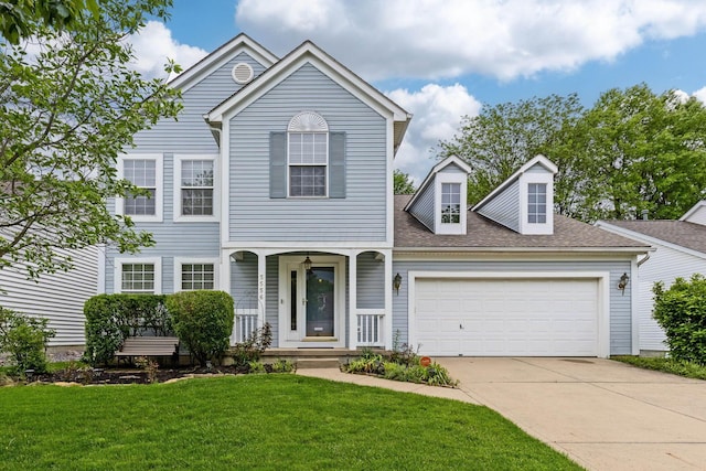5556 Falco Dr, Westerville, OH 43081 - traditional-style home featuring a porch, driveway, an attached garage, a front yard, and a shingled roof