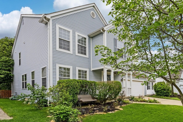 5556 Falco Dr, Westerville, OH 43081 - view of front facade featuring an attached garage and concrete driveway