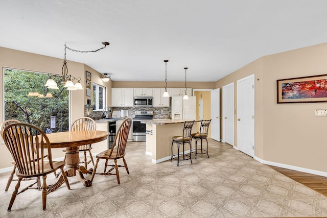5556 Falco Dr, Westerville, OH 43081 - dining space with light flooring and baseboards