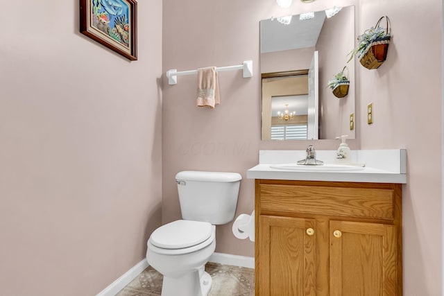 5556 Falco Dr, Westerville, OH 43081 - bathroom with baseboards, toilet, and vanity