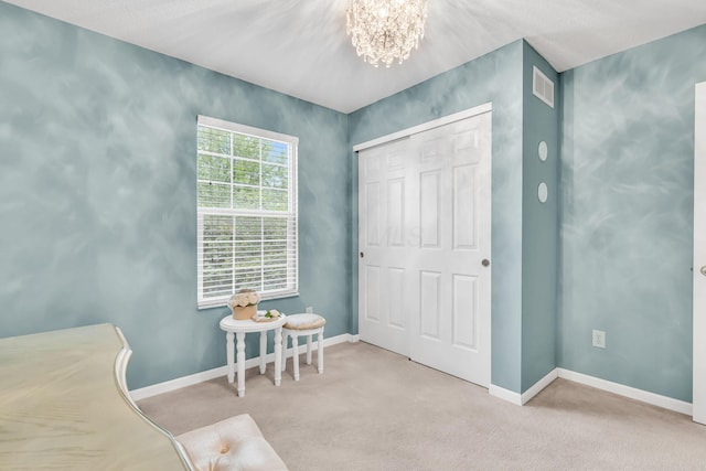 5556 Falco Dr, Westerville, OH 43081 - carpeted bedroom with a chandelier, baseboards, and a closet