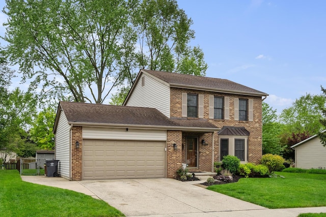 460 Lytton Way, Columbus, OH 43230 - traditional home featuring a garage, concrete driveway, brick siding, and roof with shingles
