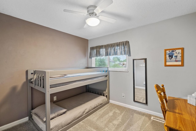 460 Lytton Way, Columbus, OH 43230 - bedroom with carpet, baseboards, a ceiling fan, and a textured ceiling