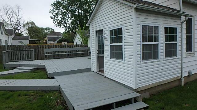 43 Oak St, Delaware, OH 43015 - view of property exterior featuring a wooden deck and fence