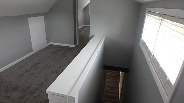 43 Oak St, Delaware, OH 43015 - stairway with carpet flooring and baseboards
