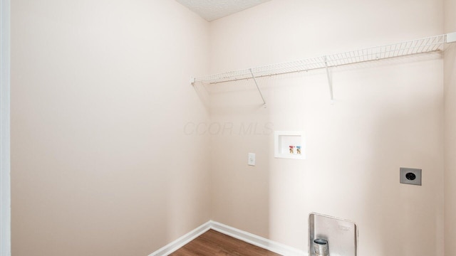 776 Brevard Cir, Pickerington, OH 43147 - clothes washing area featuring electric dryer hookup, dark wood-type flooring, baseboards, and hookup for a washing machine