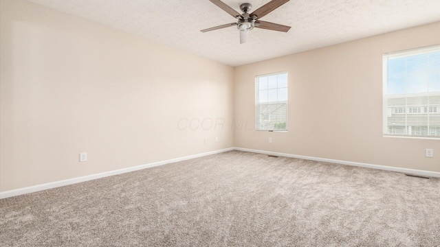 776 Brevard Cir, Pickerington, OH 43147 - empty room with ceiling fan, carpet flooring, baseboards, and a textured ceiling