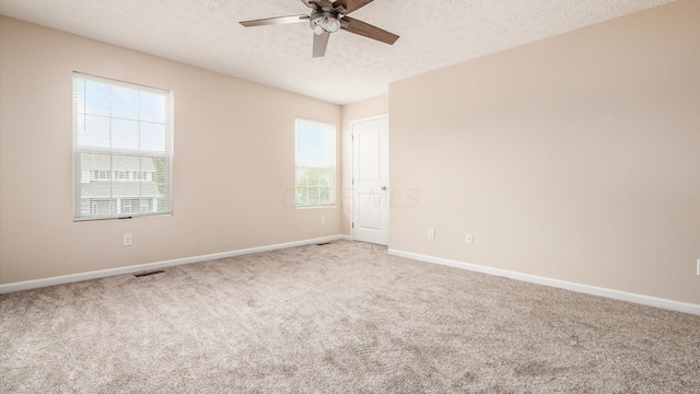776 Brevard Cir, Pickerington, OH 43147 - carpeted spare room with a textured ceiling, ceiling fan, and baseboards