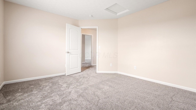 776 Brevard Cir, Pickerington, OH 43147 - carpeted empty room featuring attic access and baseboards