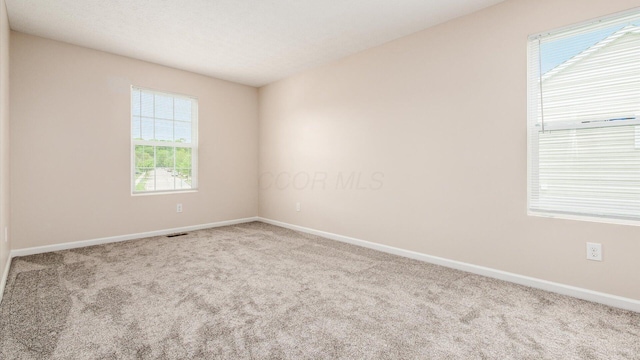 776 Brevard Cir, Pickerington, OH 43147 - empty room with carpet flooring and baseboards