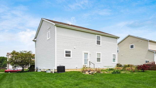 776 Brevard Cir, Pickerington, OH 43147 - rear view of house with central AC and a lawn