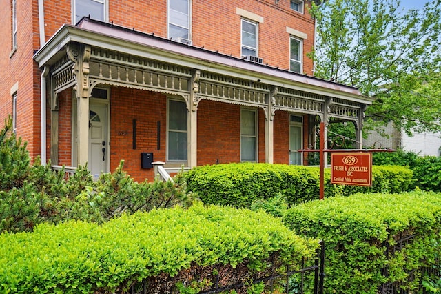 699 S Front St, Columbus, OH 43206 - view of exterior entry with brick siding and covered porch