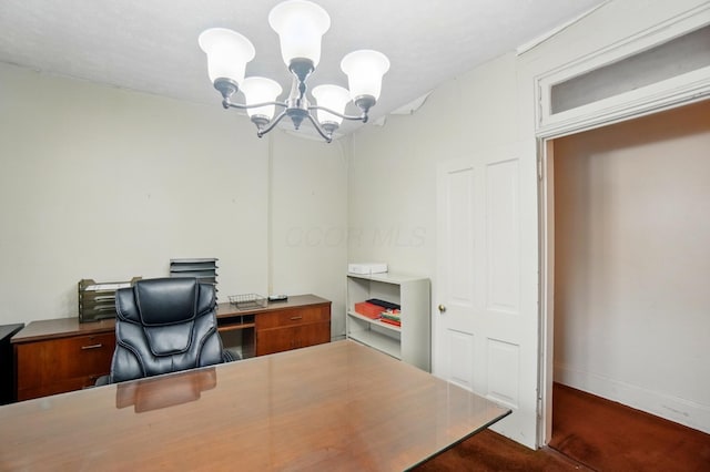 699 S Front St, Columbus, OH 43206 - home office with a chandelier, dark colored carpet, and baseboards