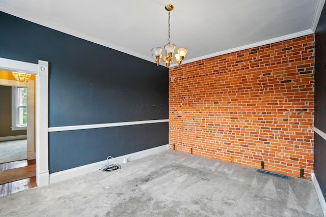 696 Bank St, Columbus, OH 43206 - empty room with a chandelier, carpet, crown molding, brick wall, and baseboards