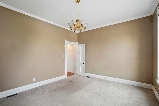 696 Bank St, Columbus, OH 43206 - carpeted empty room featuring a chandelier, baseboards, and crown molding