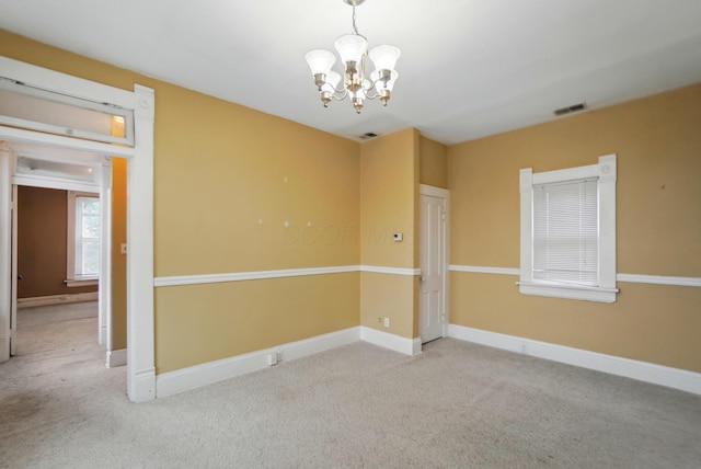 696 Bank St, Columbus, OH 43206 - carpeted spare room featuring a chandelier and baseboards