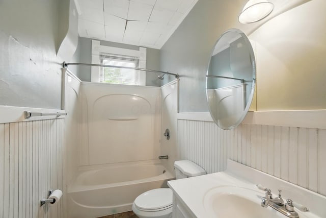 696 Bank St, Columbus, OH 43206 - full bath with shower / bath combination, toilet, vanity, and a wainscoted wall