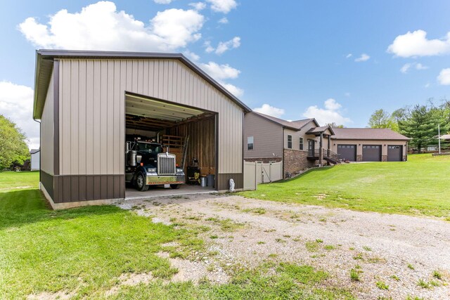 1885 Greenbriar Way, Nashport, OH 43830 - view of pole building with a yard