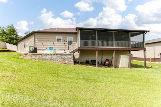 1885 Greenbriar Way, Nashport, OH 43830 - rear view of house featuring a sunroom, a lawn, and stairs