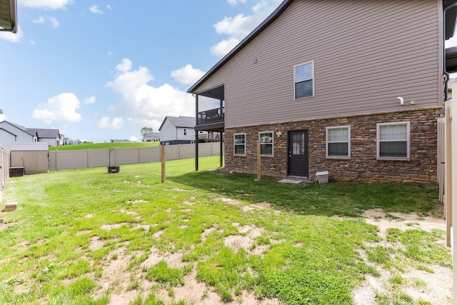 1885 Greenbriar Way, Nashport, OH 43830 - rear view of property featuring stone siding and a balcony