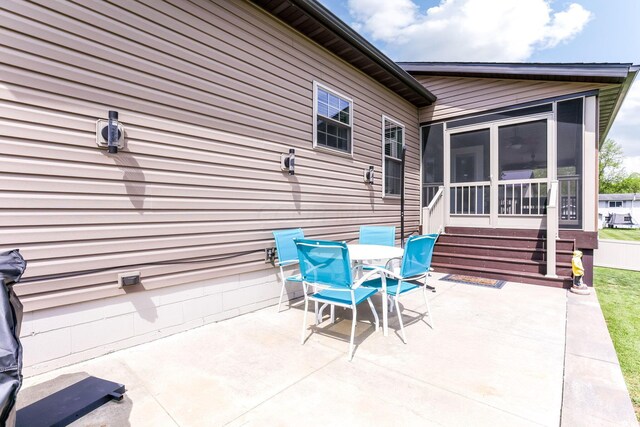 1885 Greenbriar Way, Nashport, OH 43830 - view of patio / terrace featuring a sunroom and outdoor dining space