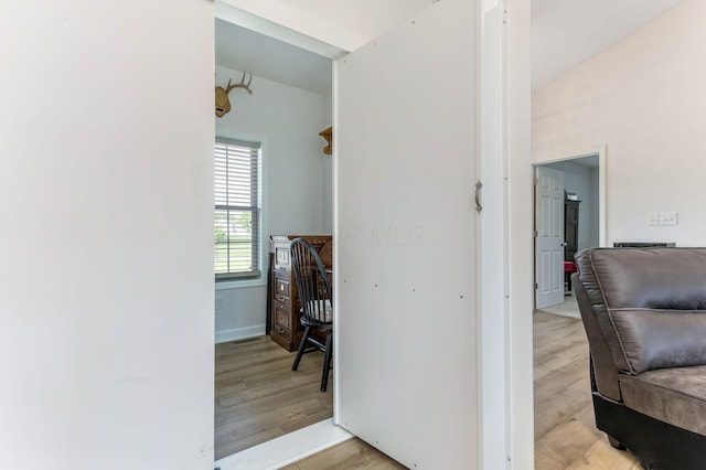 1885 Greenbriar Way, Nashport, OH 43830 - hallway with light wood-style flooring and baseboards