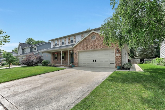 113 Bridgeport Way, Delaware, OH 43015 - traditional-style house featuring brick siding, a garage, driveway, and covered porch
