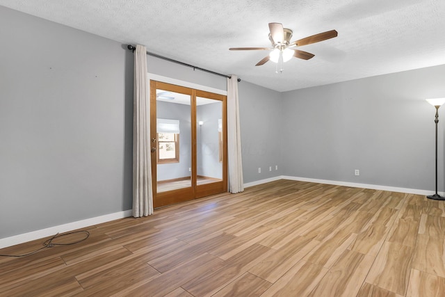 113 Bridgeport Way, Delaware, OH 43015 - spare room with light wood-type flooring, a ceiling fan, and a textured ceiling