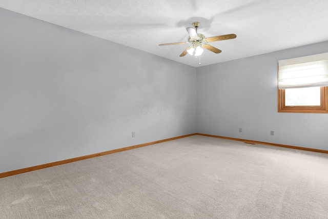 113 Bridgeport Way, Delaware, OH 43015 - spare room featuring light carpet and a ceiling fan