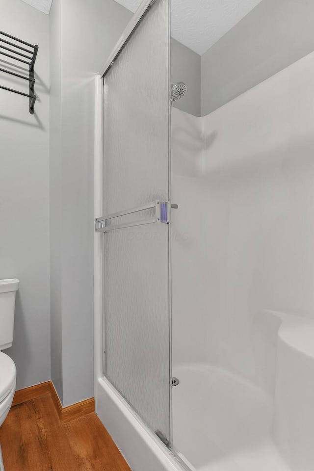 113 Bridgeport Way, Delaware, OH 43015 - full bath with a shower stall and wood finished floors