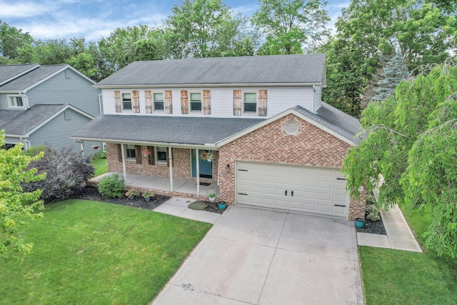 113 Bridgeport Way, Delaware, OH 43015 - traditional-style house featuring a porch, brick siding, driveway, an attached garage, and a front yard