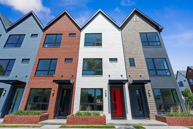 1106 Oak St Unit 12, Columbus, OH 43205 - townhome / multi-family property featuring brick siding