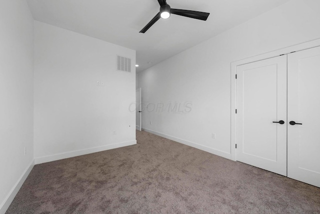 1106 Oak St Unit 12, Columbus, OH 43205 - unfurnished bedroom featuring carpet flooring, baseboards, and a closet