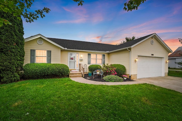415 Yencer St, Baltimore, OH 43105 - ranch-style house with a garage, concrete driveway, a yard, and roof with shingles