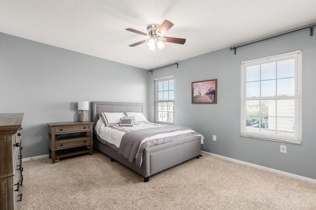5958 Central College Rd, New Albany, OH 43054 - bedroom featuring carpet flooring, baseboards, and a ceiling fan
