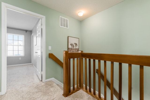 5958 Central College Rd, New Albany, OH 43054 - corridor featuring an upstairs landing, carpet floors, and baseboards